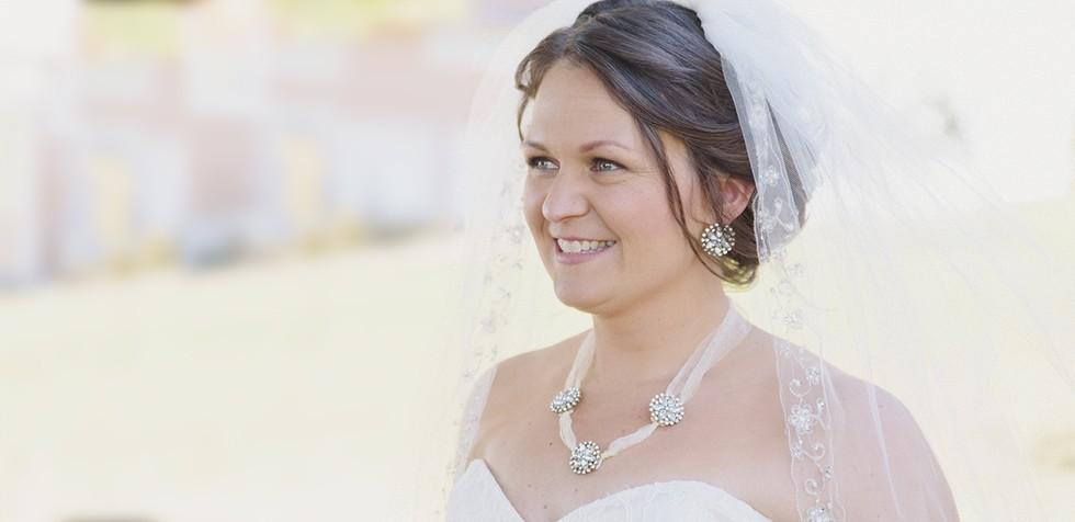 A black and white photo of a bride.