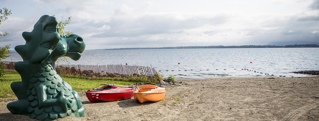 kayakers on beach near champ figure