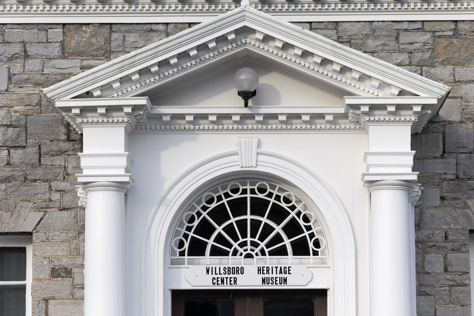 The ornate pillars and glass transom above the entry way to the Willsboro Heritage Center Museum.
