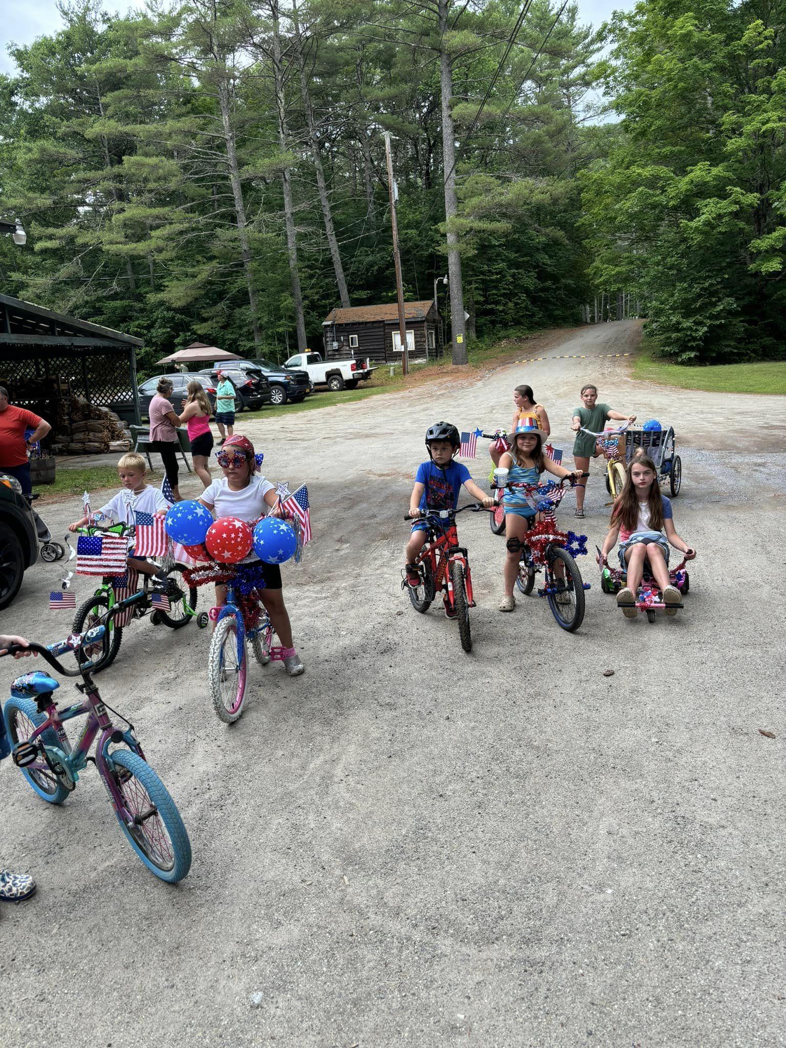 Kids on bikes decorated to celebrate Independence day