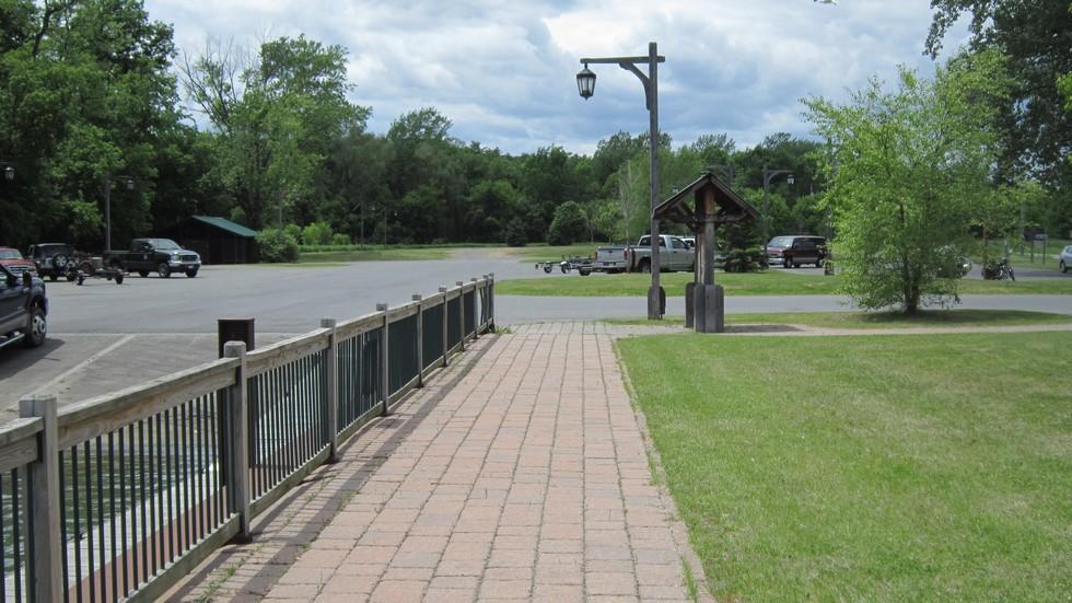 The side walk leading up to a boat launch.