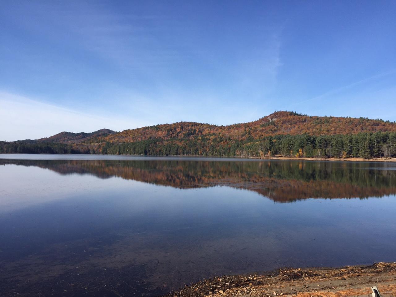 A mirrored-view on the water of mountains.