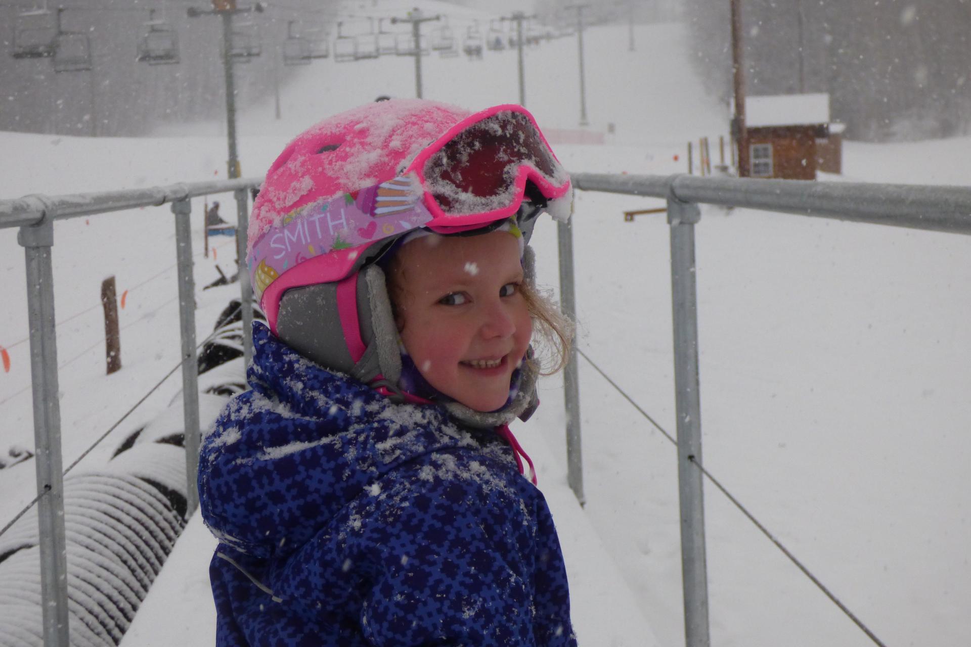 A kid at Titus Mountain on a snowy day.