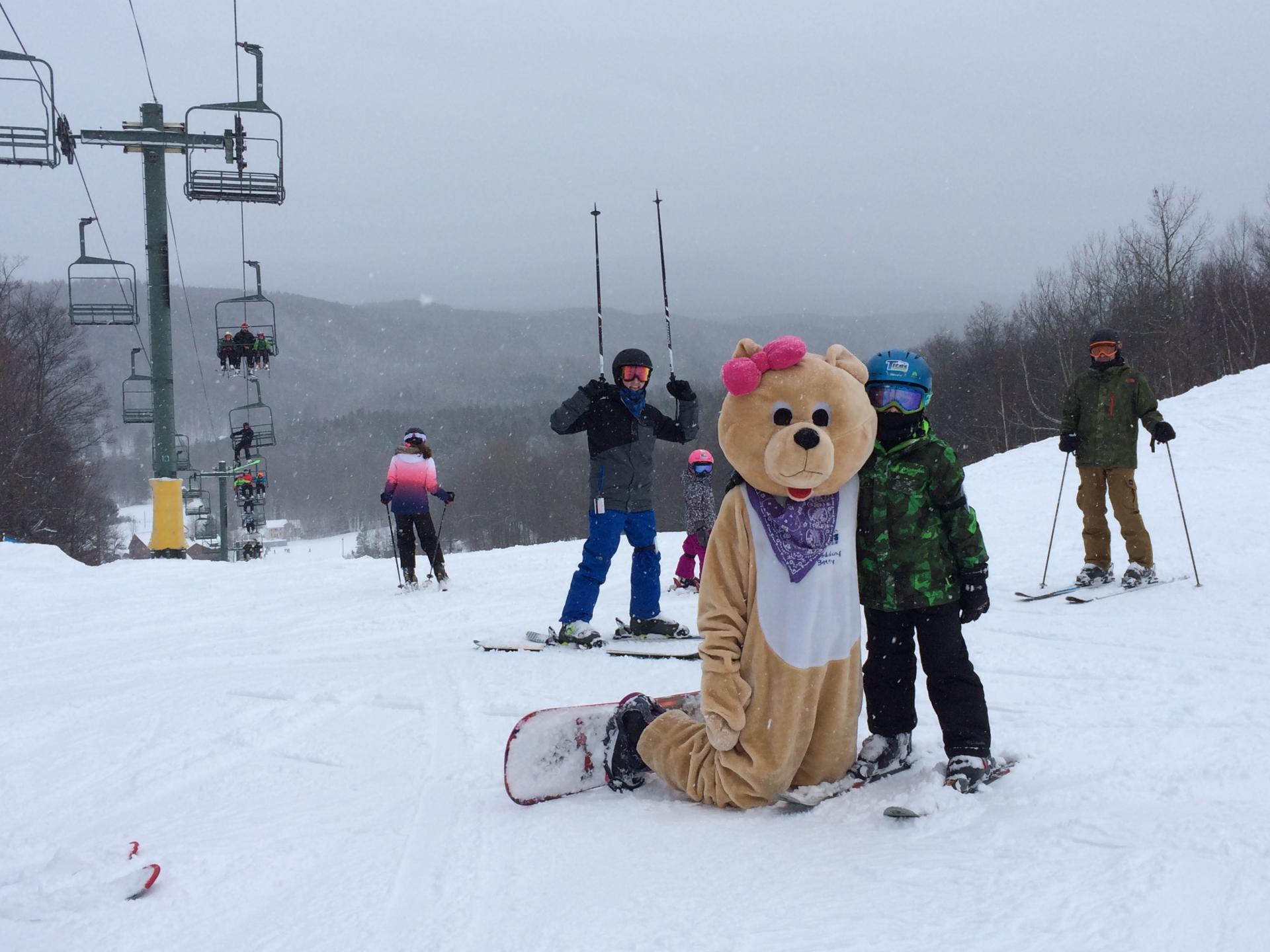 Someone in a teddy bear costume at Titus Mountain