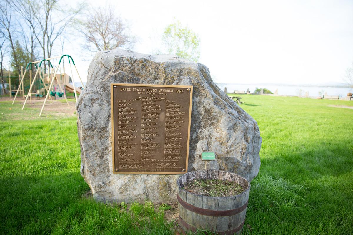A metal plaque on a rock