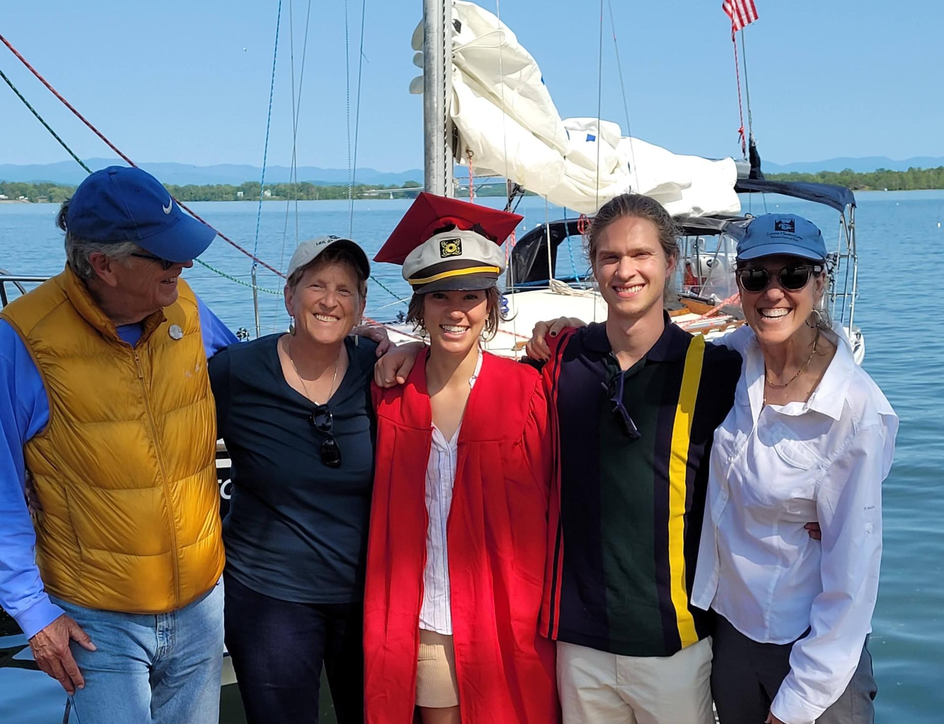 People taking a photo on a sailboat