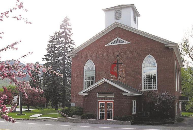 Brick exterior of the front entrance of the church
