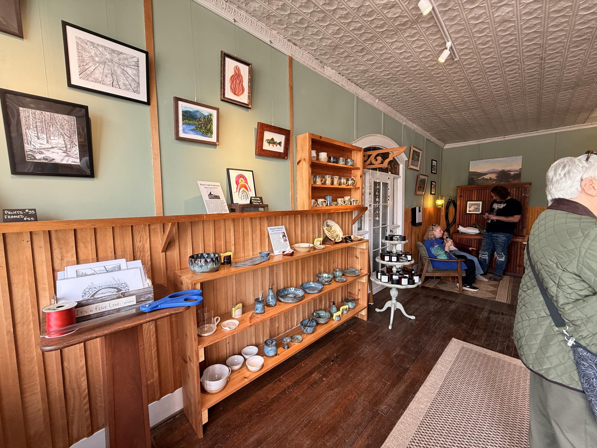  hats and wall decor on display at The Finishing Stone.