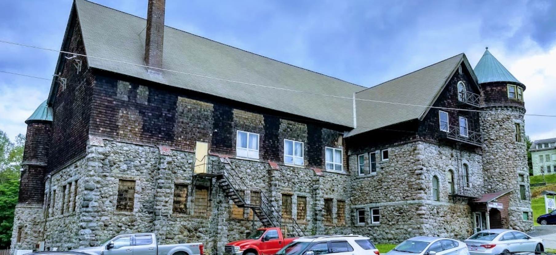 A stacked stone building.