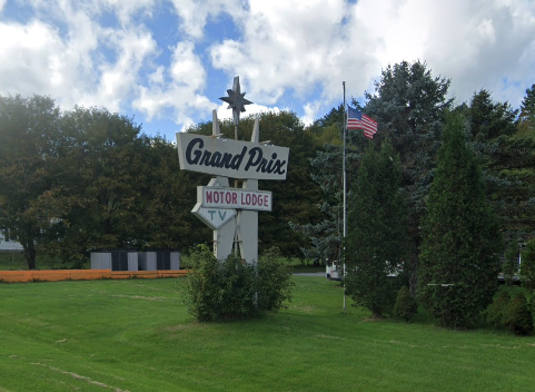 The sign for the Grand Prix Motor Lodge