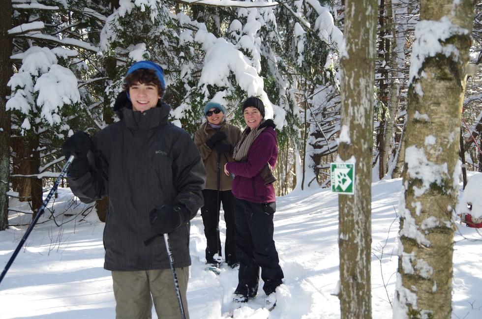 people snowshoeing